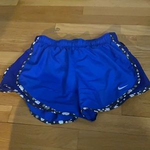 Blue and black Nike athletic shorts